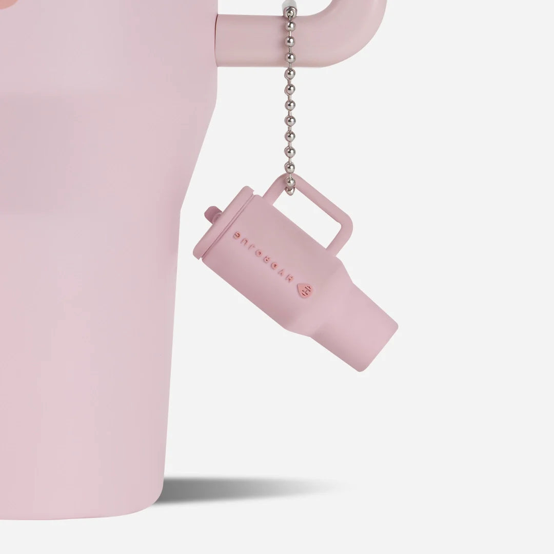 traveler-keychain-i1 Web-TravelerKeychainPhotos-PinkSand2.webp